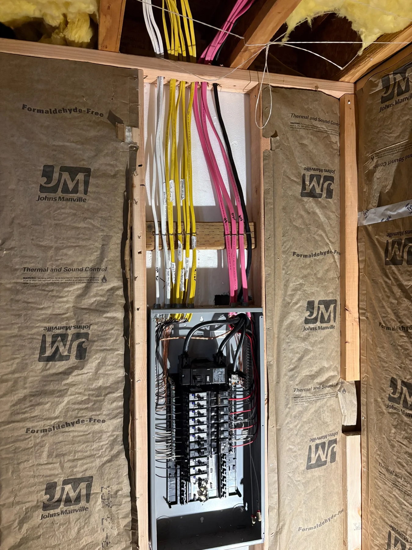 Finished residential breaker panel with organized wiring